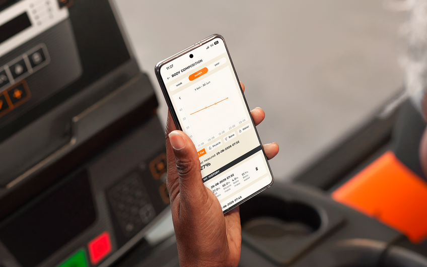 Member tracking body fat percentage and progress using the Body Composition feature in the Basic-Fit app.